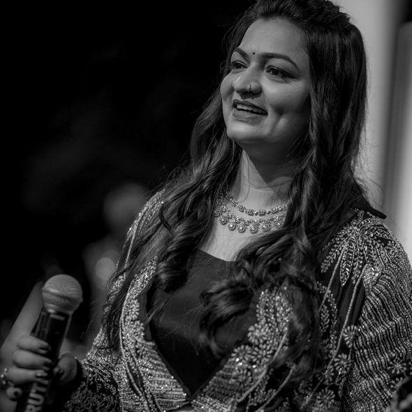 Outdoor fashion photo of beautiful young woman surrounded by flowers of apple-tree. Spring blossom. Summer vibes